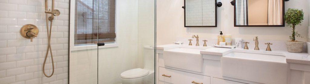 Dual sink vanity and tiled walkin shower are highlighted features in this newly remodeled bathroom in Toledo