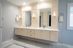 Newly remodeled bathroom with luxury floating double vanity, ample lighting, large mirrors and tons of storage.
