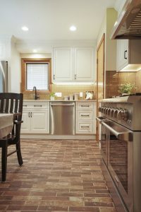 Brick flooring in a newly remodeled kitchen.