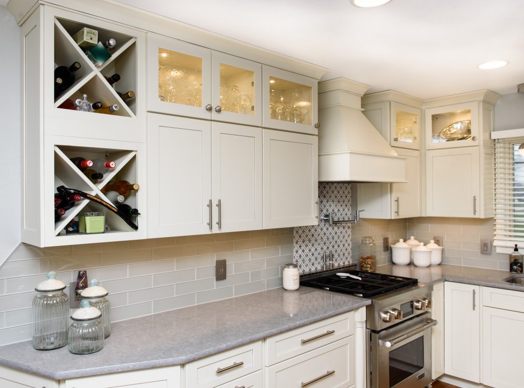 Close up of cream colored cabinets in a recently renovated kitchen. 