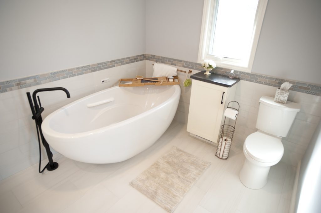 Updated, renovated bathroom with freestanding tub. 